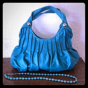 🔹Turquoise Handbag